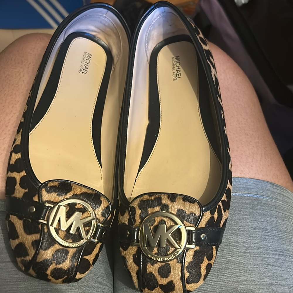 Tan and brown mk flats worn once